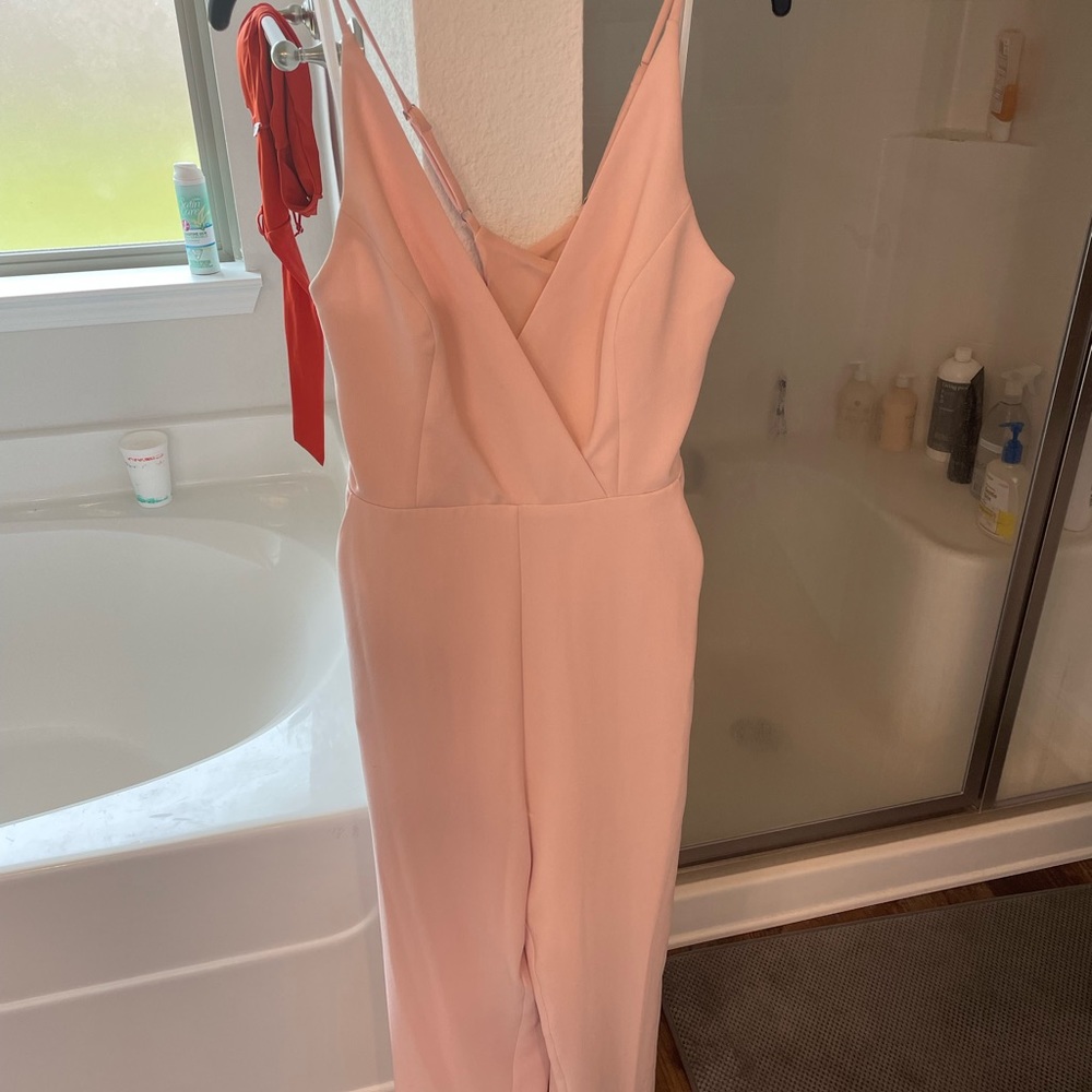 Blush pink jumper from Dillard’s. Size 8 NWT.